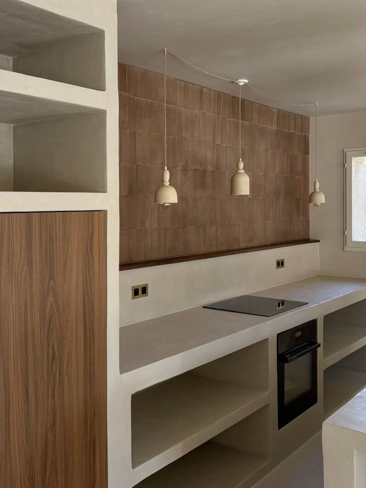 Reforma integral con cocina de microcemento y azulejos terracota — Arenys de Mar, 2023